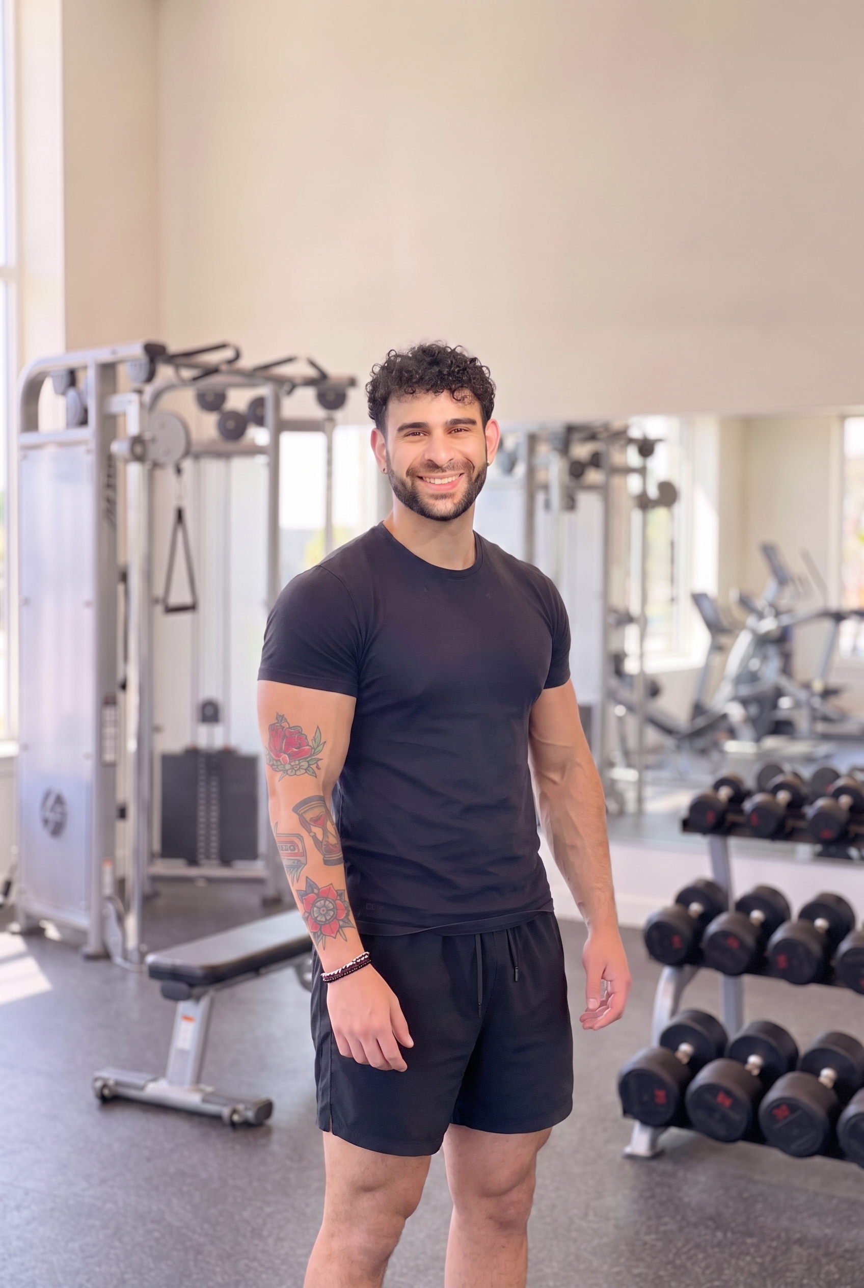 Panagiotis Petridis, online fitness coach, at the gym